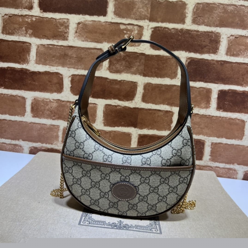 G*u*i top handle bags